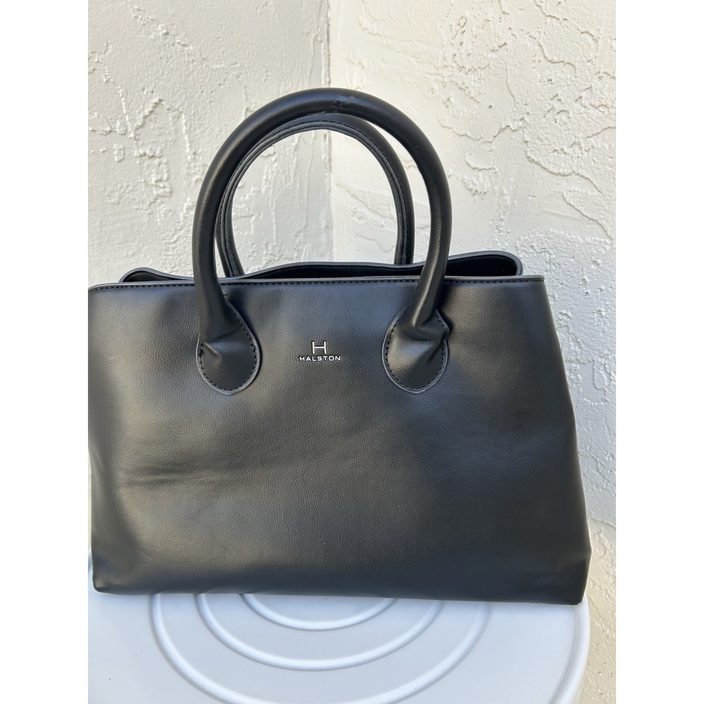 Halston Heritage black satchel in leather.